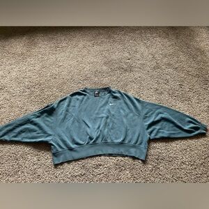 Nike women’s size large teal batwing crop sweatshirt